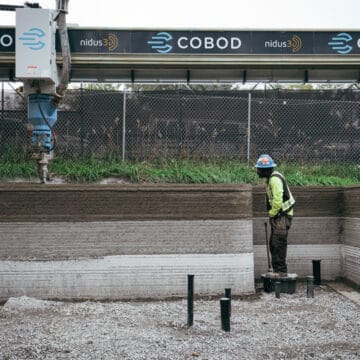 One worker and a BOD2 3D printing in Canada