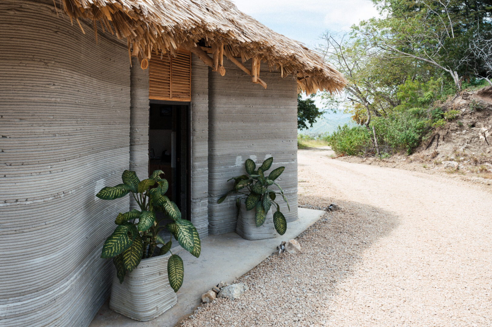 Curved walls of the first 3D printed house in Guatemala