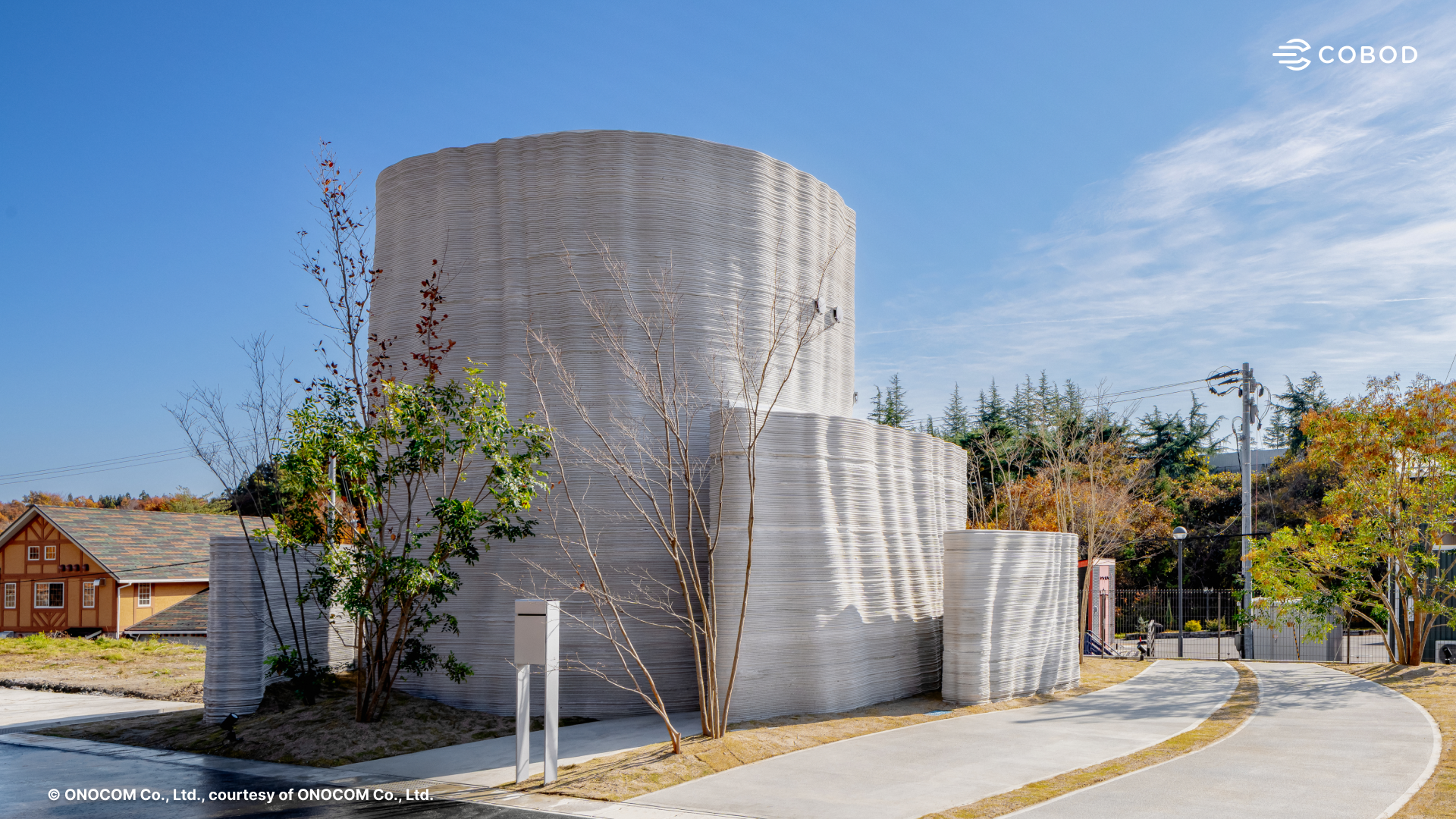Exterior view of the 50 m² (537 sq.ft.) two-story 3D printed reinforced concrete house.