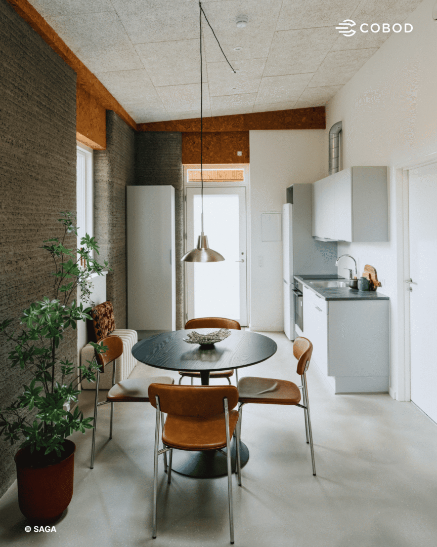 A finished apartment's kitchen and dining area.